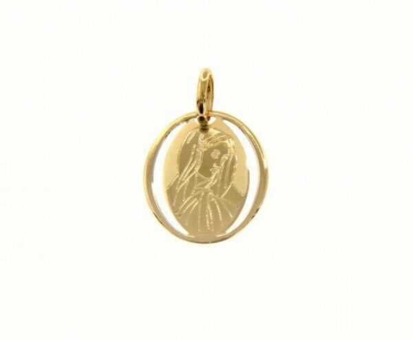 Madonna in yellow gold weight 0.70 g.