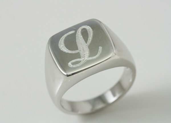 Chevalier ring with engraved initial