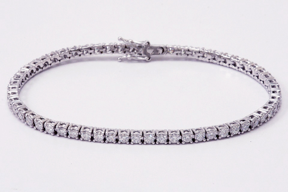 BRACCIALE TENNIS INTER DIAMANTI NERI NATURALI CT. 3.96 E ZAFFIRI