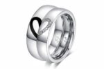 Steel ring with half heart in black enamel