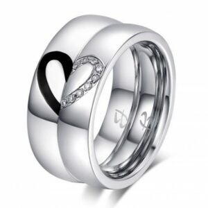 Steel ring with half heart of white crystals