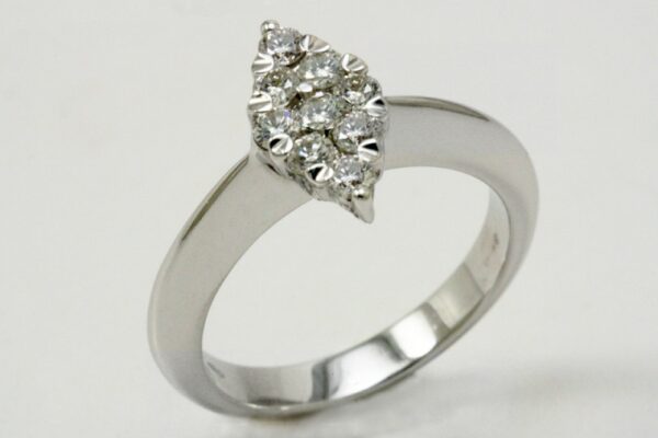 WHITE GOLD RING WITH CT DIAMONDS. 0.48:XNUMX