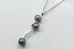 NECKLACE WITH BLACK TAHITI PEARLS 9.5-10-10.5 MM AND DIAMONDS CT. 0.08:XNUMX