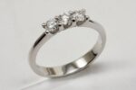 TRILOGY RING WITH BRILLIANT CUT DIAMONDS CT. 0.48:XNUMX