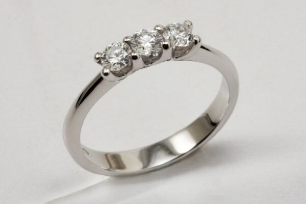 TRILOGY RING WITH BRILLIANT CUT DIAMONDS CT. 0.48:XNUMX