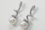 EARRINGS ORIENTAL PEARLS 8 MM AND DIAMONDS CT. 0.15:XNUMX