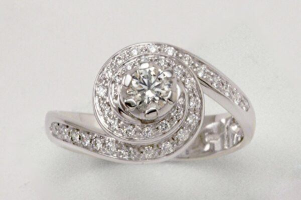 Anello solitario con diamante taglio brillante ct. 0.31 e spirale di diamanti ct. 0.24